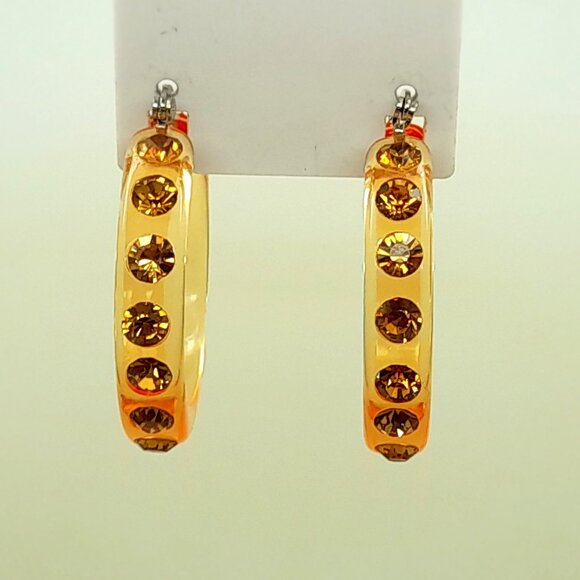 TOPAZ RHINESTONE LADIES/WOMEN FASHION 1.5 INCH PLASTIC HOOP EARRINGS #1 - Picture 1 of 2